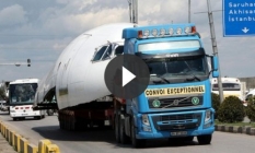 Dev kargo uçağı kara yolunda TIR'larla taşındı
