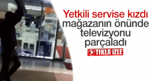 Yetkili servise kızdı mağazanın önünde televizyonu parçaladı