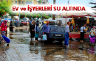 SALİHLİ’DE EV VE İŞYERLERİNİ SU BASTI 